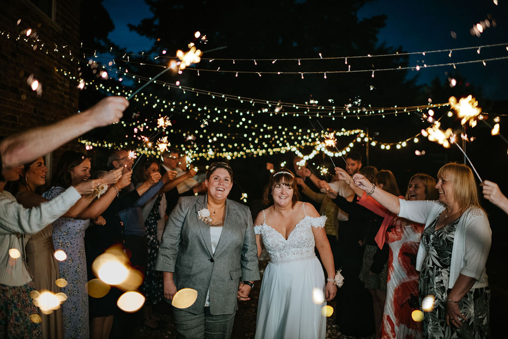 celebration of wedding evening function with fairy lights and sparklers